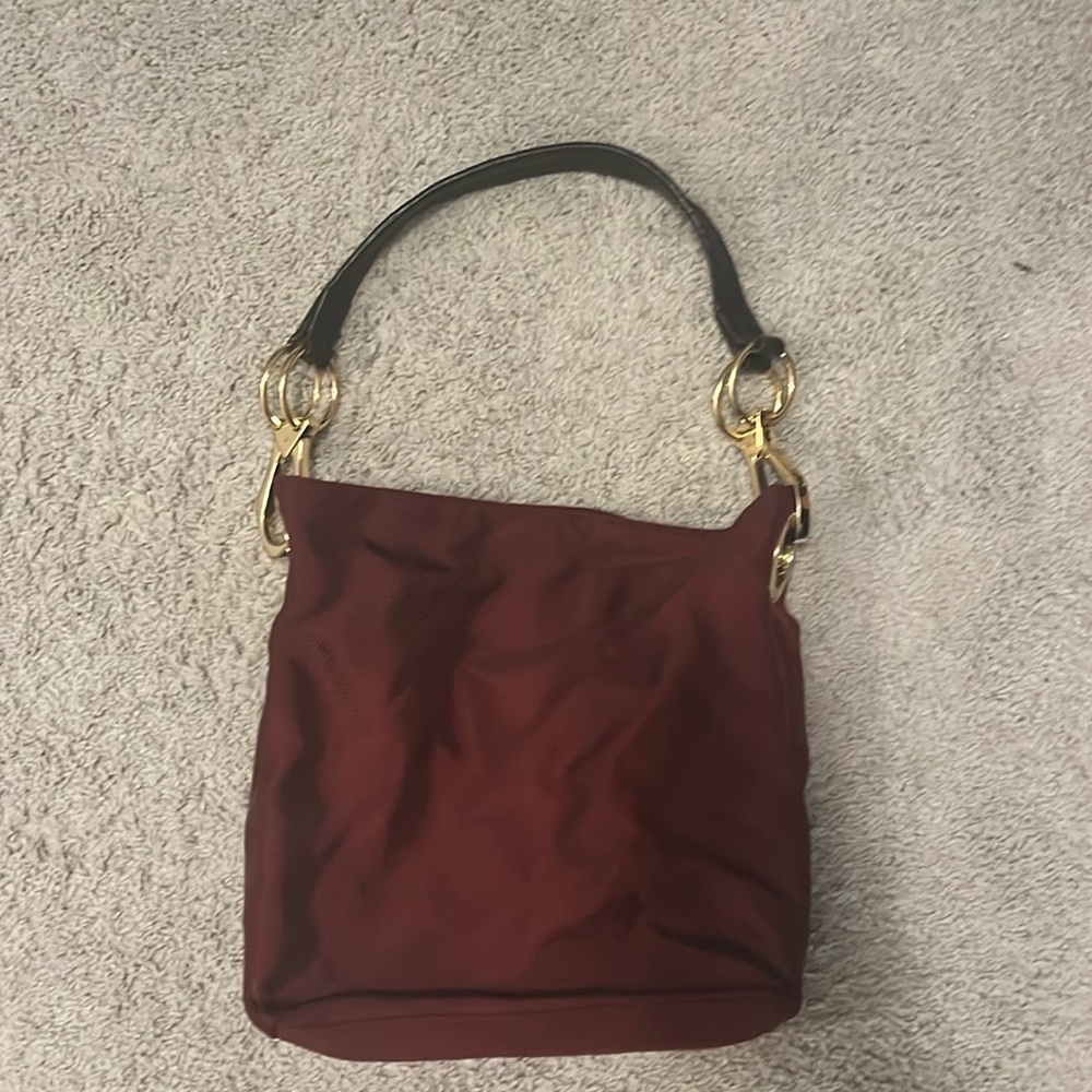 Maroon JPK Paris 75 bucket shoulder bag